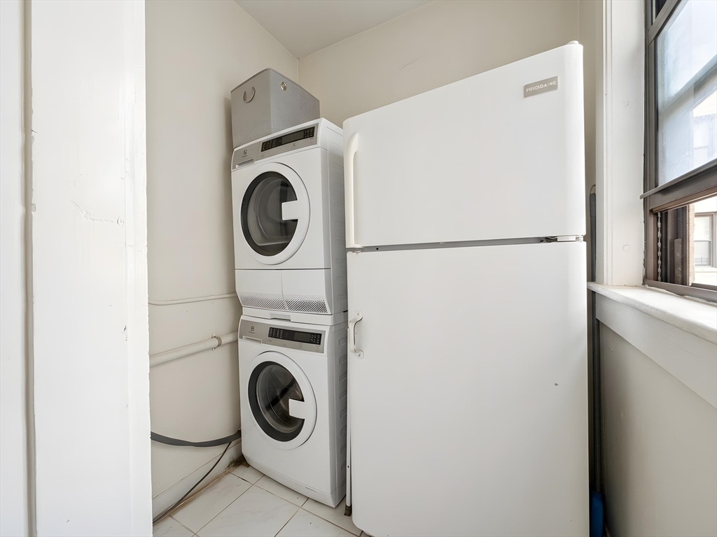 1472 Commonwealth Avenue, Unit 2 Boston, MA 02135 - Photo 5 of 16 a utility room with dryer and washer