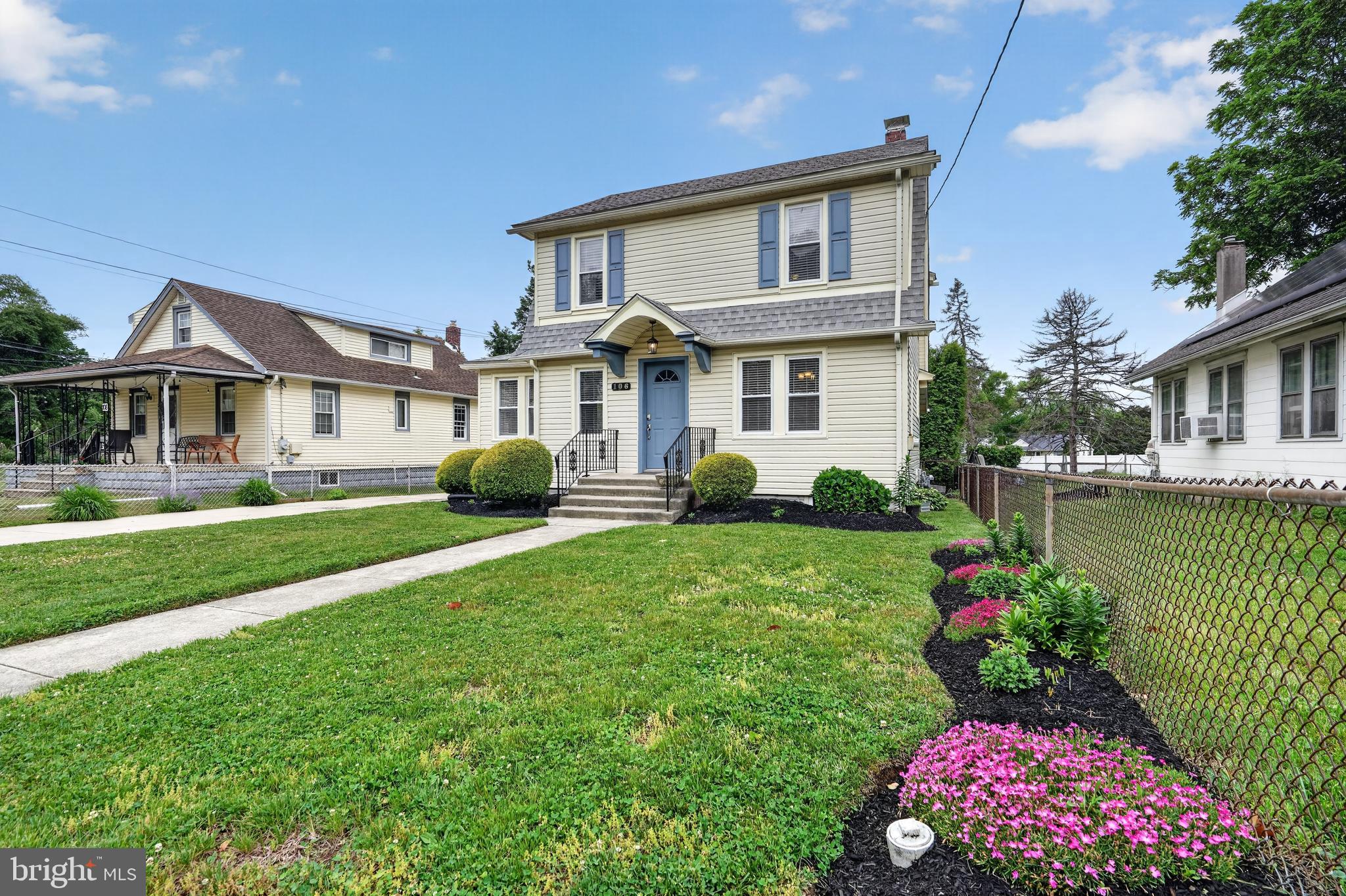106 Ford Street Voorhees, NJ 08043 - Photo 27 of 36 a front view of a house with a yard and potted plants