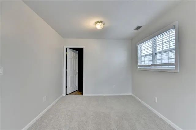 a bathroom with a sink double vanity and a shower