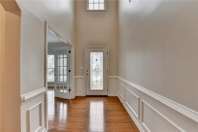 a view of entryway with wooden floor