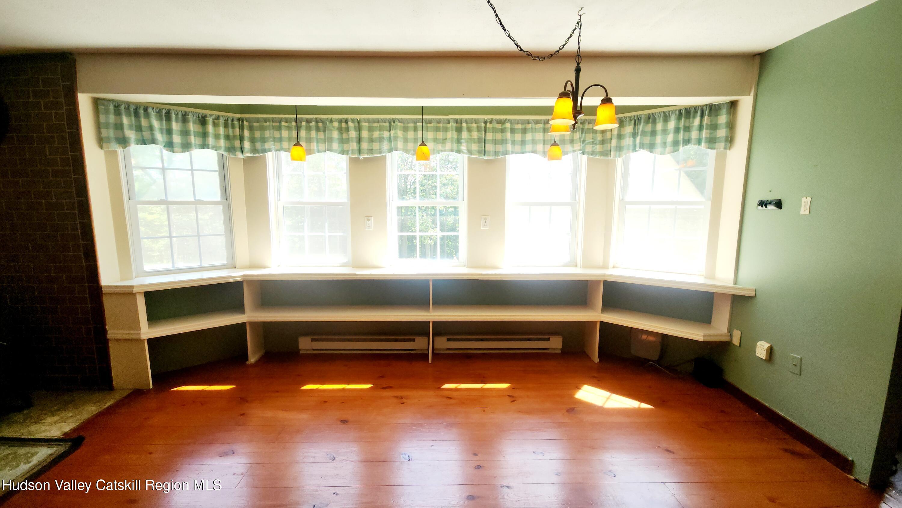 783 Broome Center Road Preston Hollow, NY 12469 - Photo 11 of 34 a view of room with window and cabinet