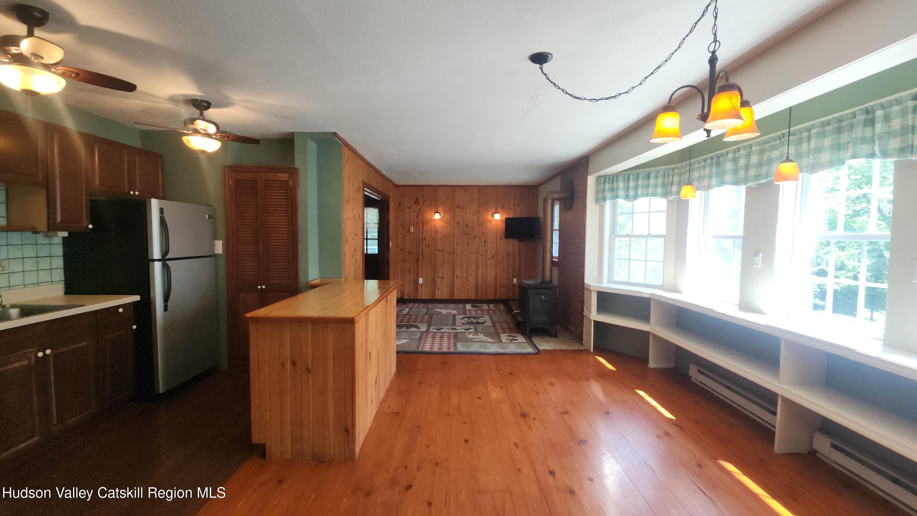 783 Broome Center Road Preston Hollow, NY 12469 - Photo 12 of 34 a view of kitchen with furniture and large window