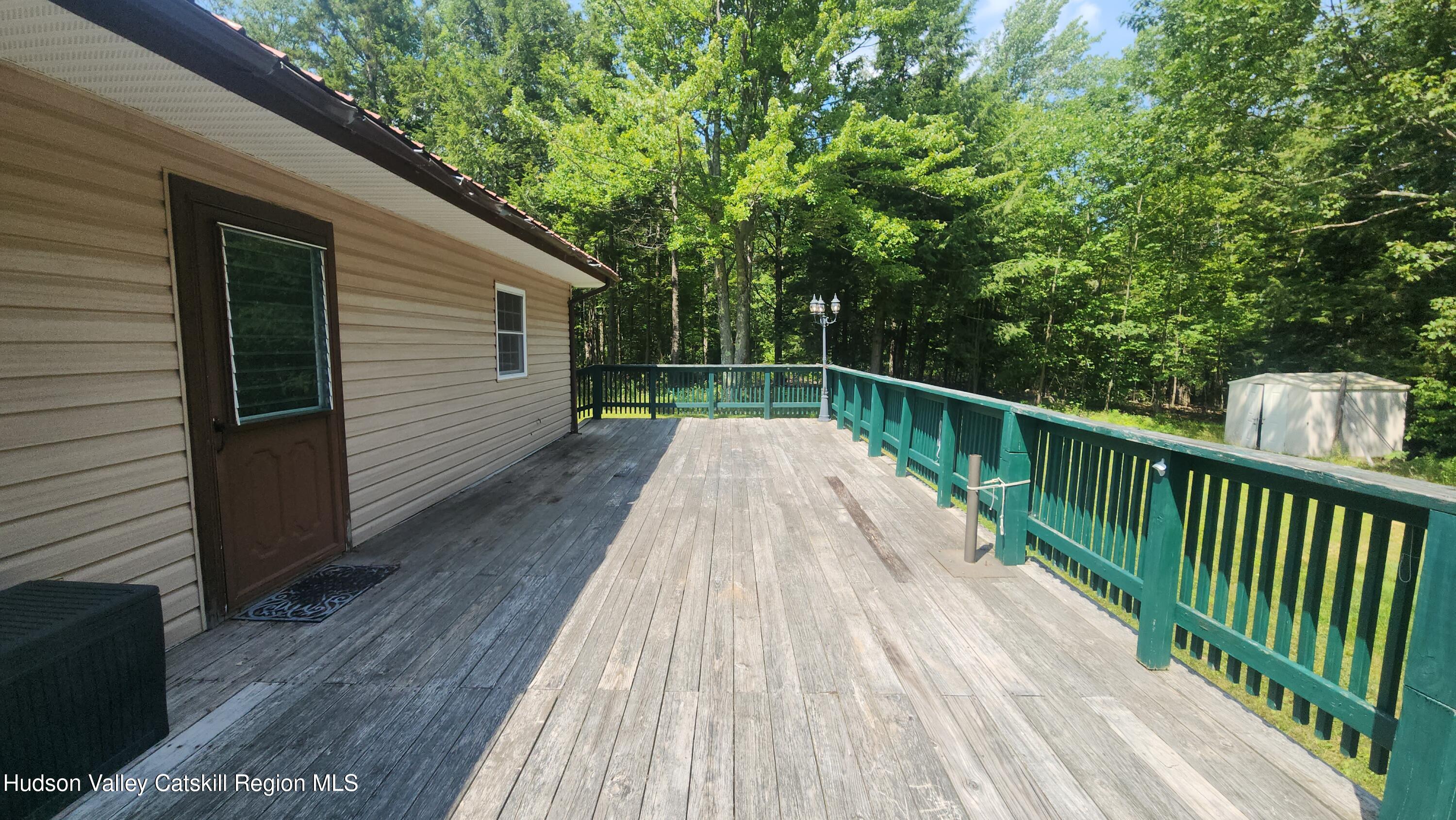 783 Broome Center Road Preston Hollow, NY 12469 - Photo 27 of 34 a view of balcony with wooden floor and fence