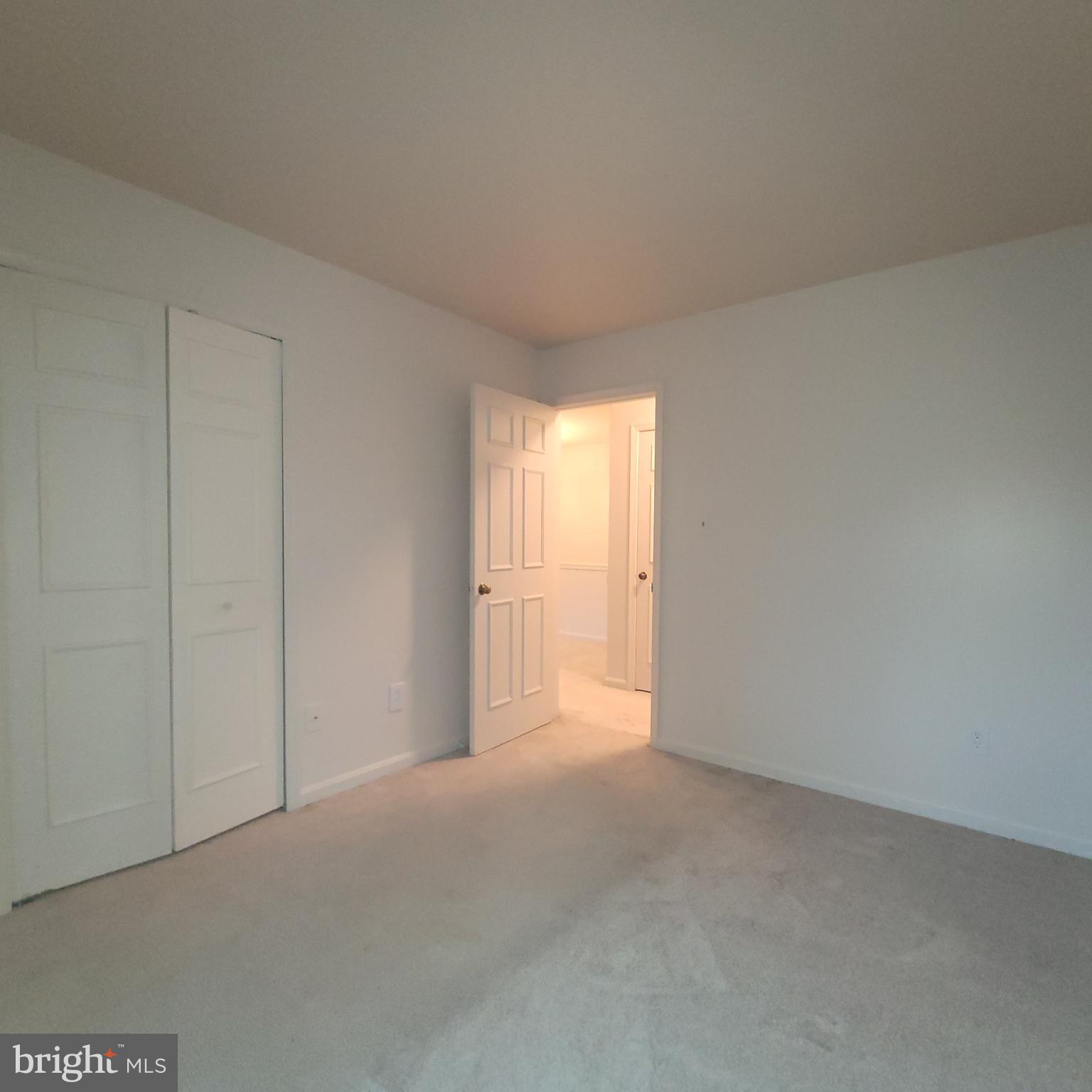 6903 B Sandra Marie Circle, Unit 6903B Alexandria, VA 22310 - Photo 17 of 21 a view of an empty room and a window