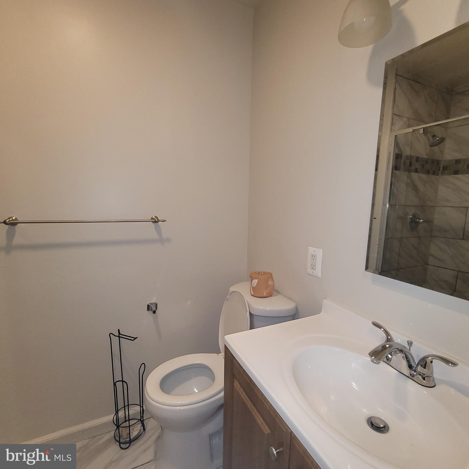 6903 B Sandra Marie Circle, Unit 6903B Alexandria, VA 22310 - Photo 19 of 21 a bathroom with a sink and a toilet