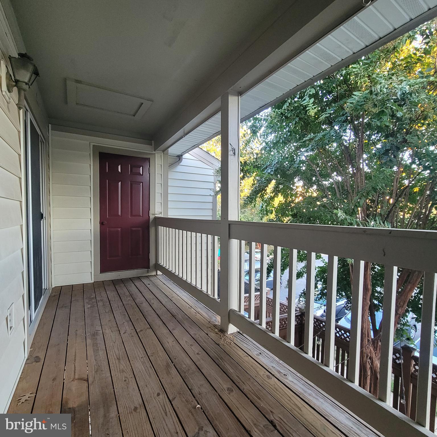 6903 B Sandra Marie Circle, Unit 6903B Alexandria, VA 22310 - Photo 21 of 21 a view of balcony with wooden floor