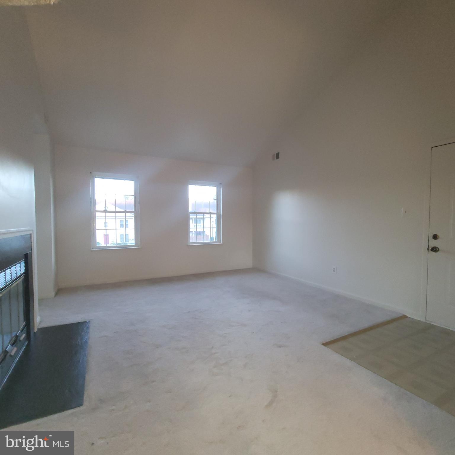 6903 B Sandra Marie Circle, Unit 6903B Alexandria, VA 22310 - Photo 7 of 21 an empty room with windows