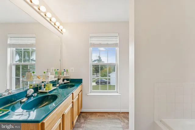 a kitchen with sink and window