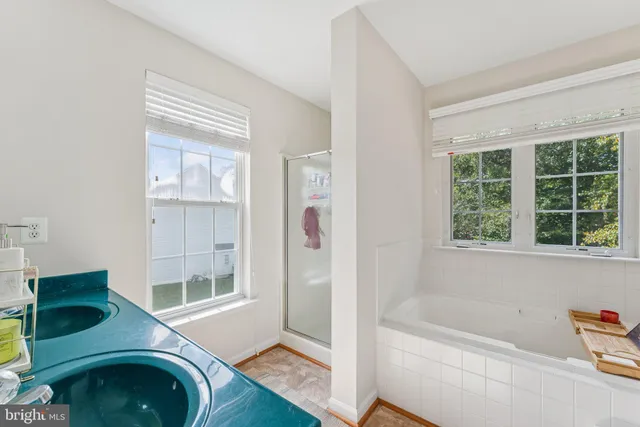 a bathroom with a sink and a bathtub