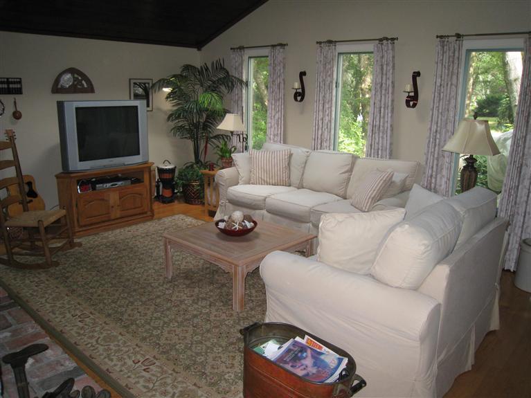 87 Sterling Road Hyannis, MA 02601 - Photo 10 of 31 a living room with furniture and a flat screen tv