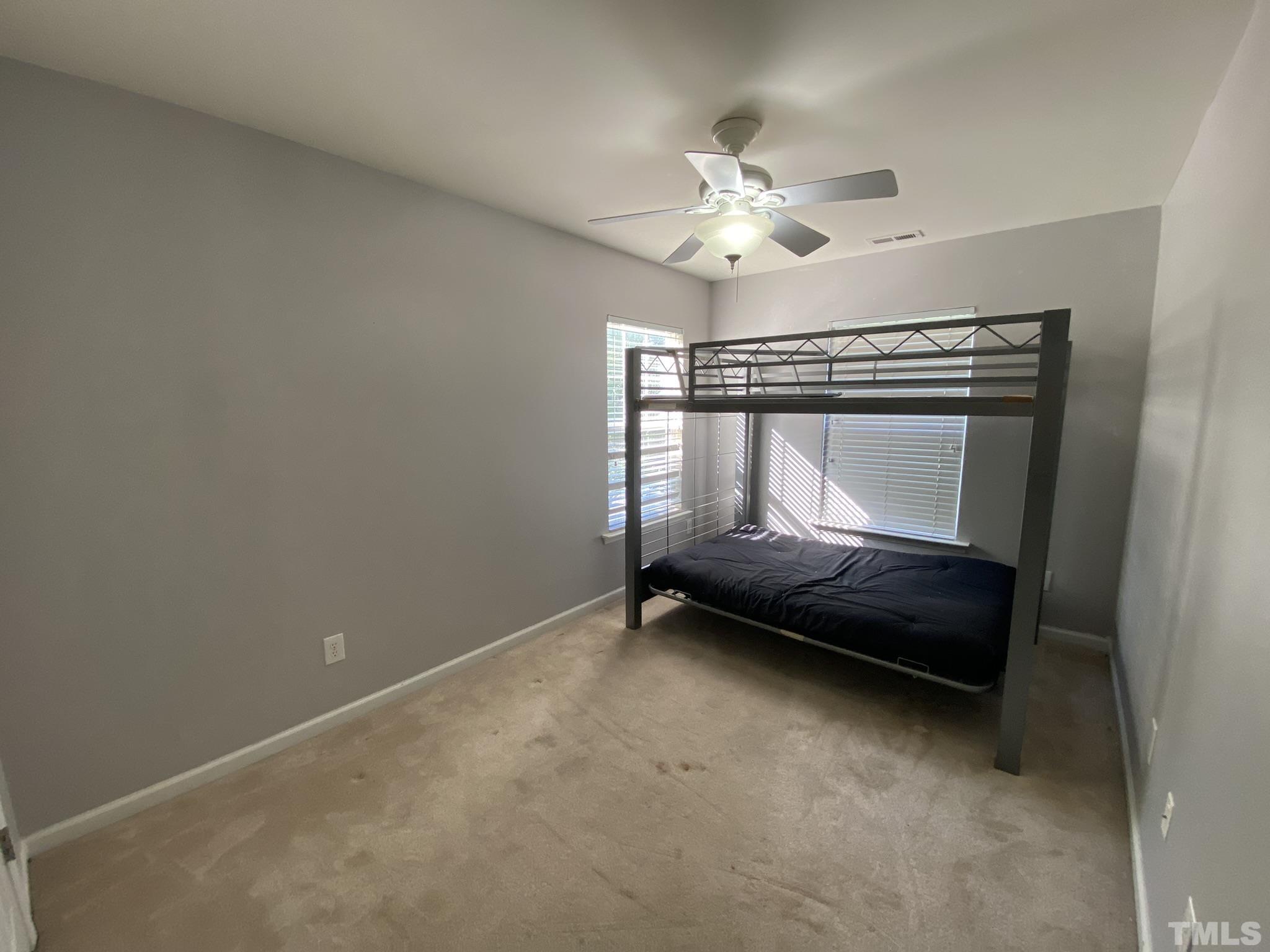 2220 Raven Road, Unit 101 Raleigh, NC 27614 - Photo 17 of 26 a view of room with a fan