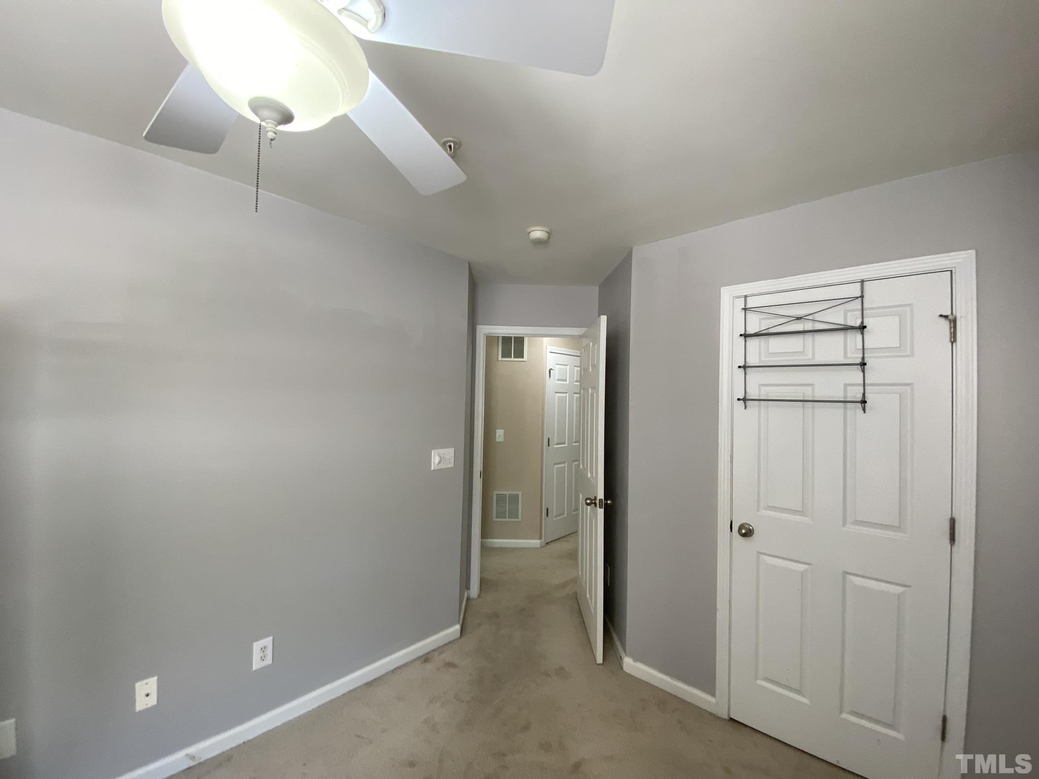 2220 Raven Road, Unit 101 Raleigh, NC 27614 - Photo 18 of 26 wooden floor in an empty room
