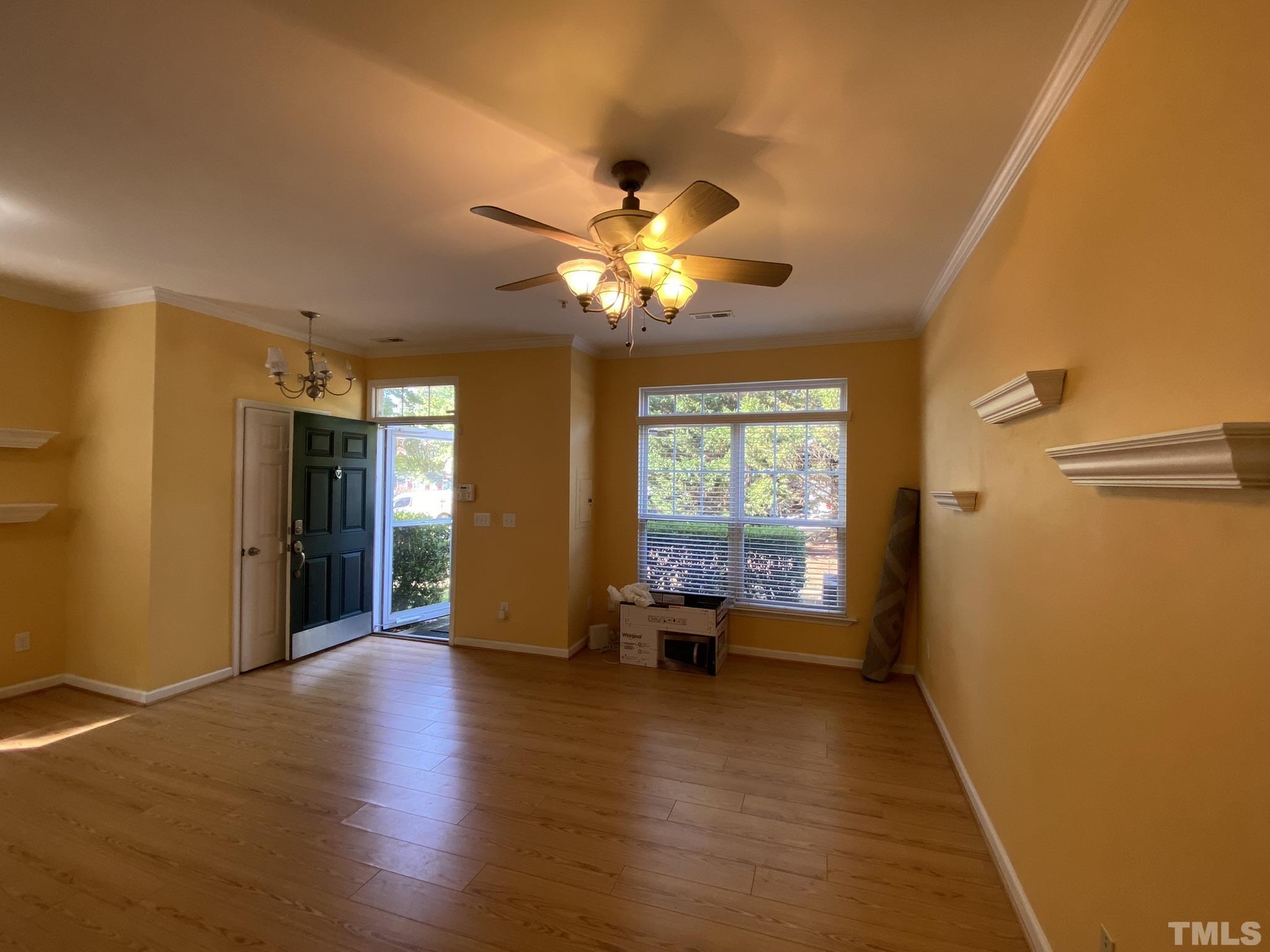 2220 Raven Road, Unit 101 Raleigh, NC 27614 - Photo 3 of 26 a view of an empty room with a window