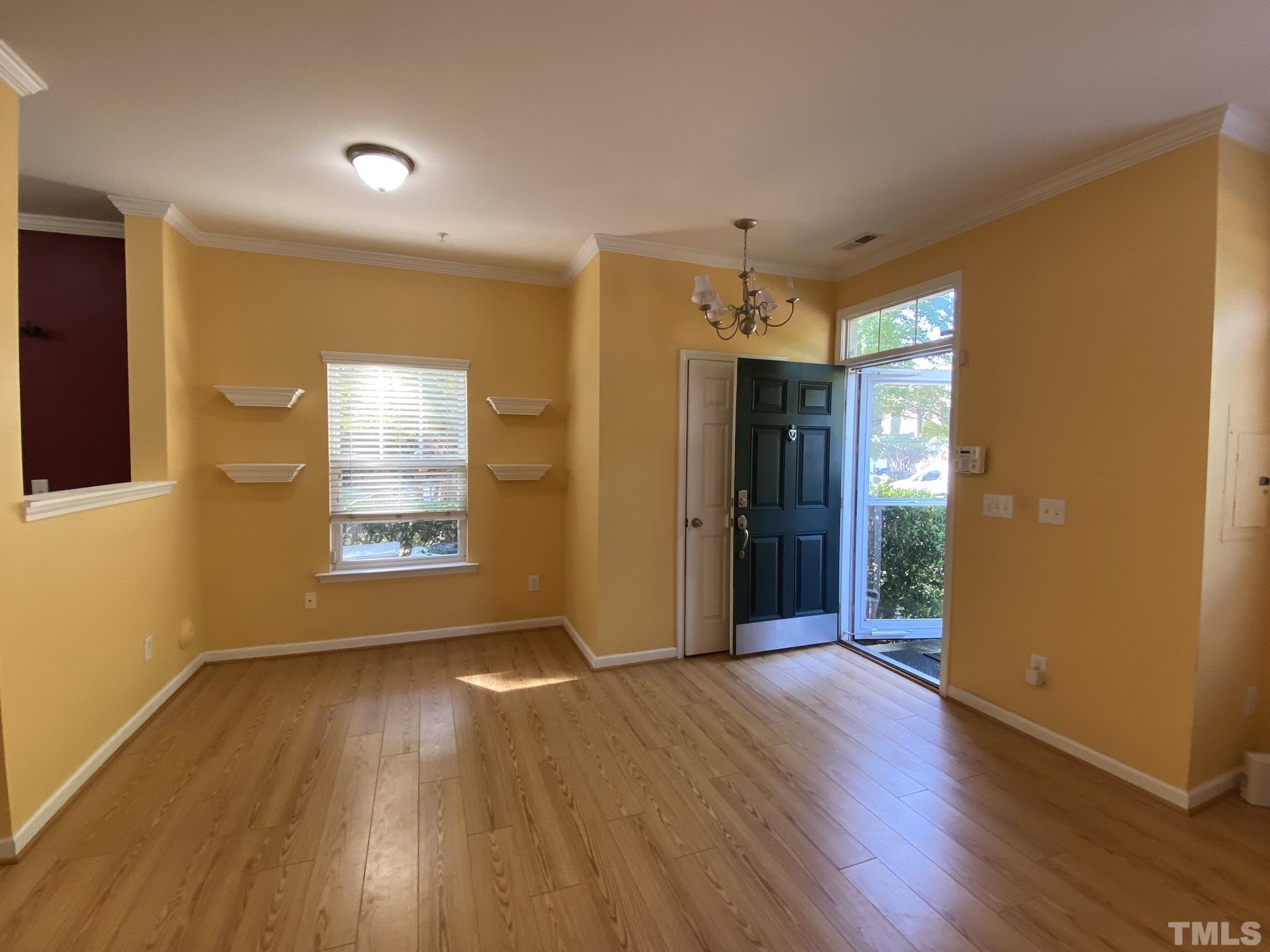 2220 Raven Road, Unit 101 Raleigh, NC 27614 - Photo 5 of 26 a view of livingroom with hardwood