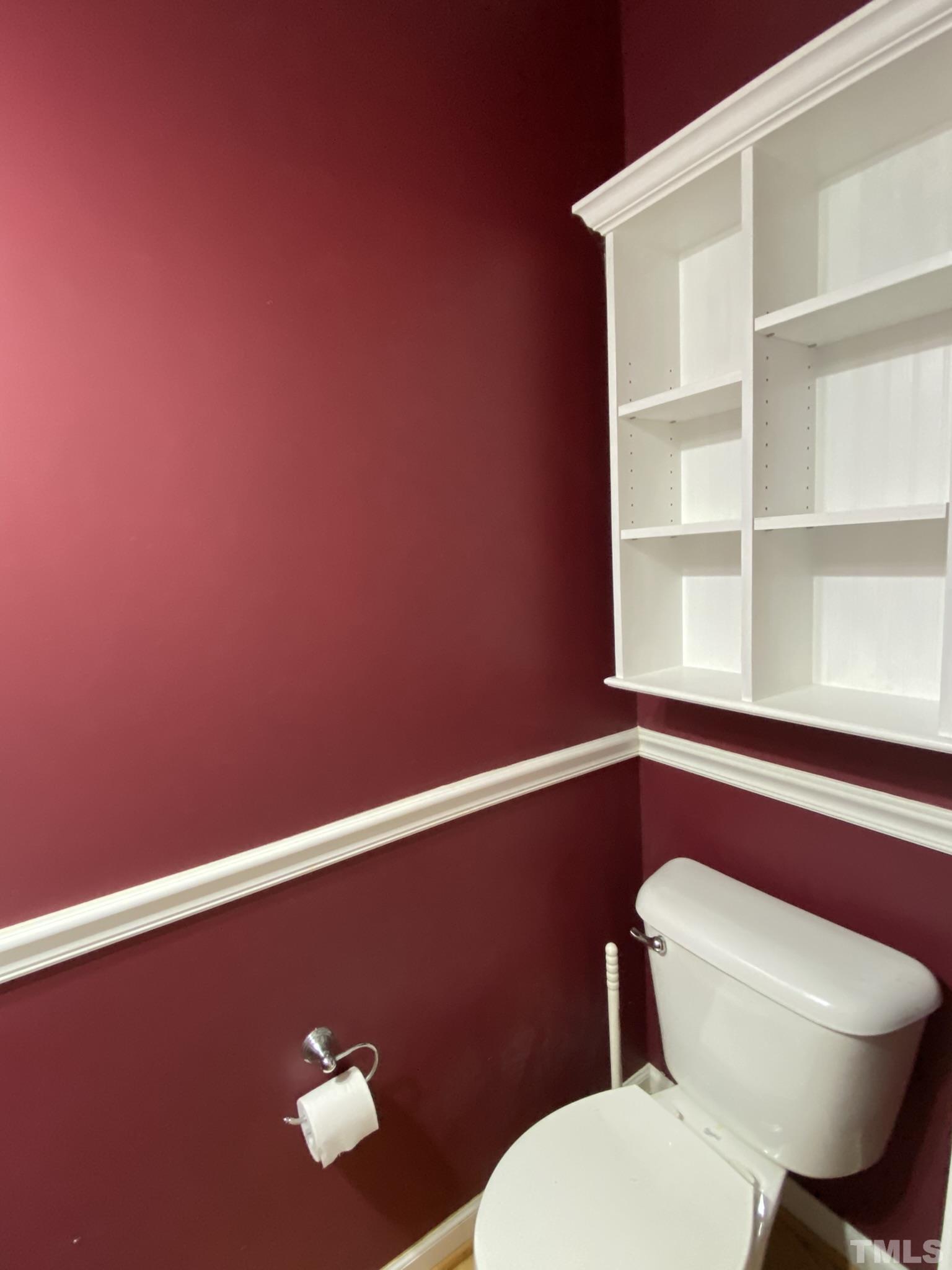 2220 Raven Road, Unit 101 Raleigh, NC 27614 - Photo 9 of 26 a bathroom with a toilet and a sink