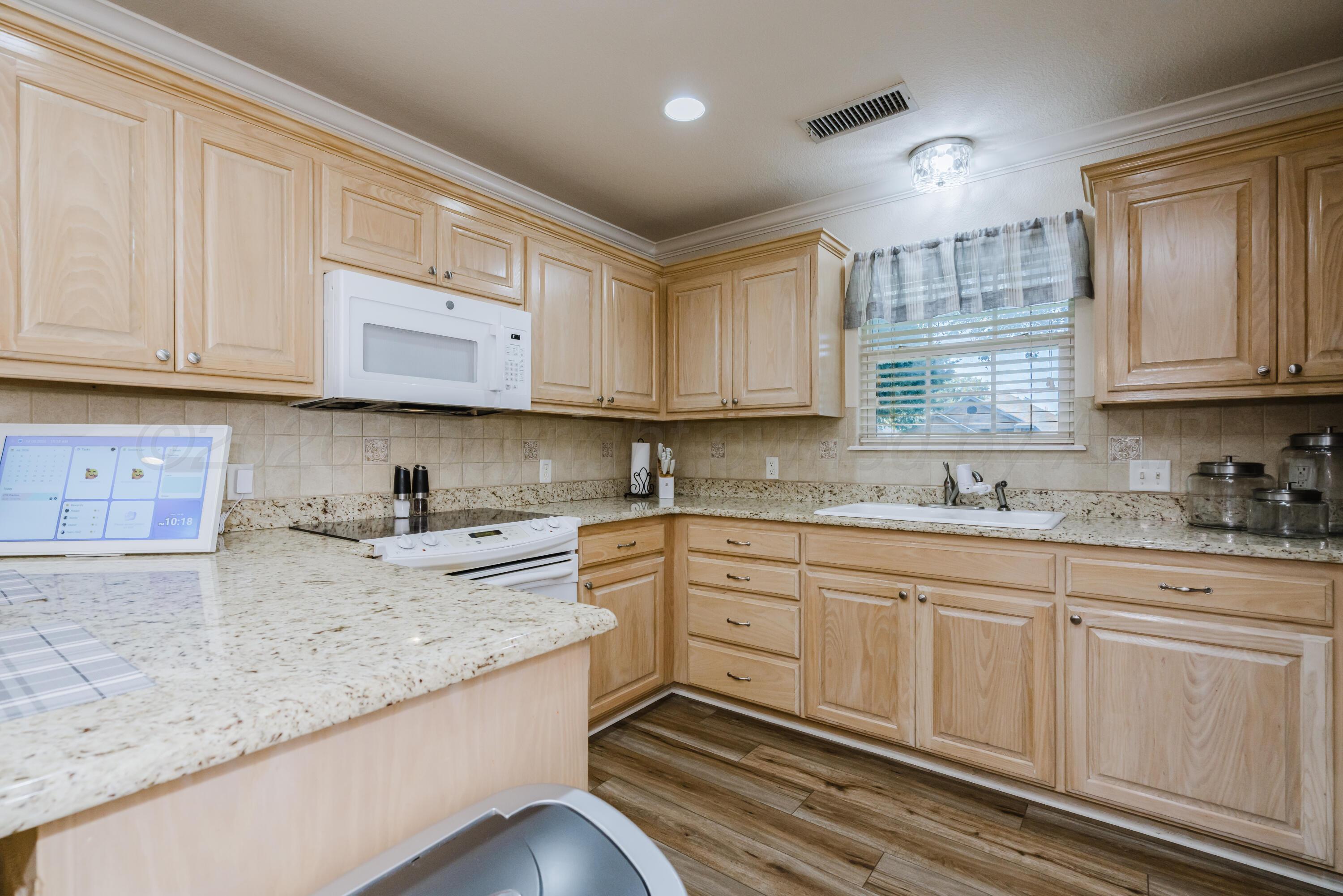 6314 Roadrunner Court Amarillo, TX 79119 - Photo 16 of 36 Kitchen View 3