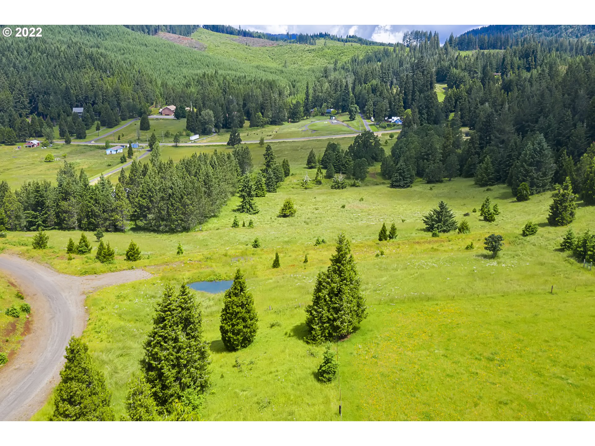 0 Bugle Loop Oakridge, OR 97463 - Photo 6 of 11 a view of a lake with a yard