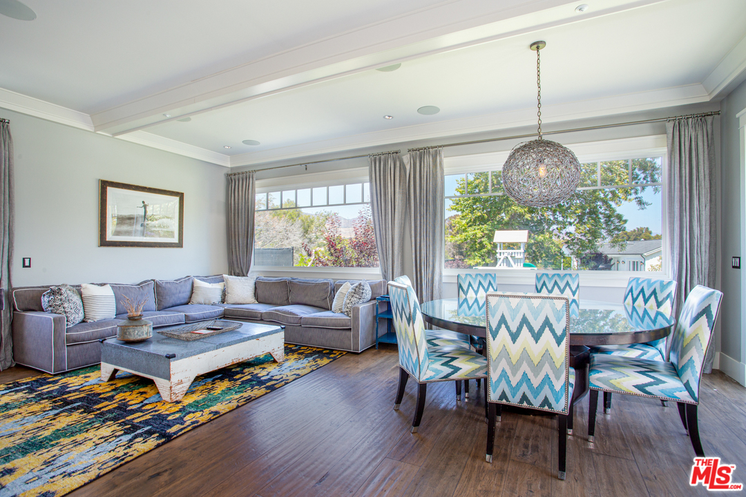 6692 Wildlife Road Malibu, CA 90265 - Photo 12 of 37 a living room with furniture and a large window