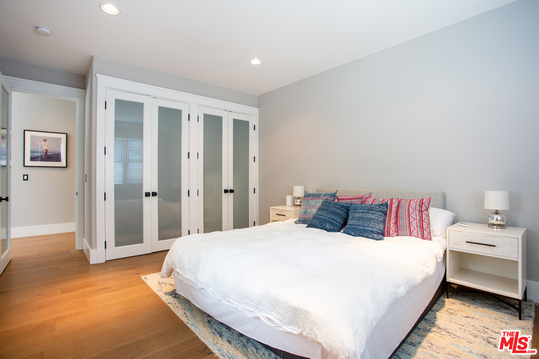 6692 Wildlife Road Malibu, CA 90265 - Photo 30 of 37 a bedroom with a bed and a cabinets