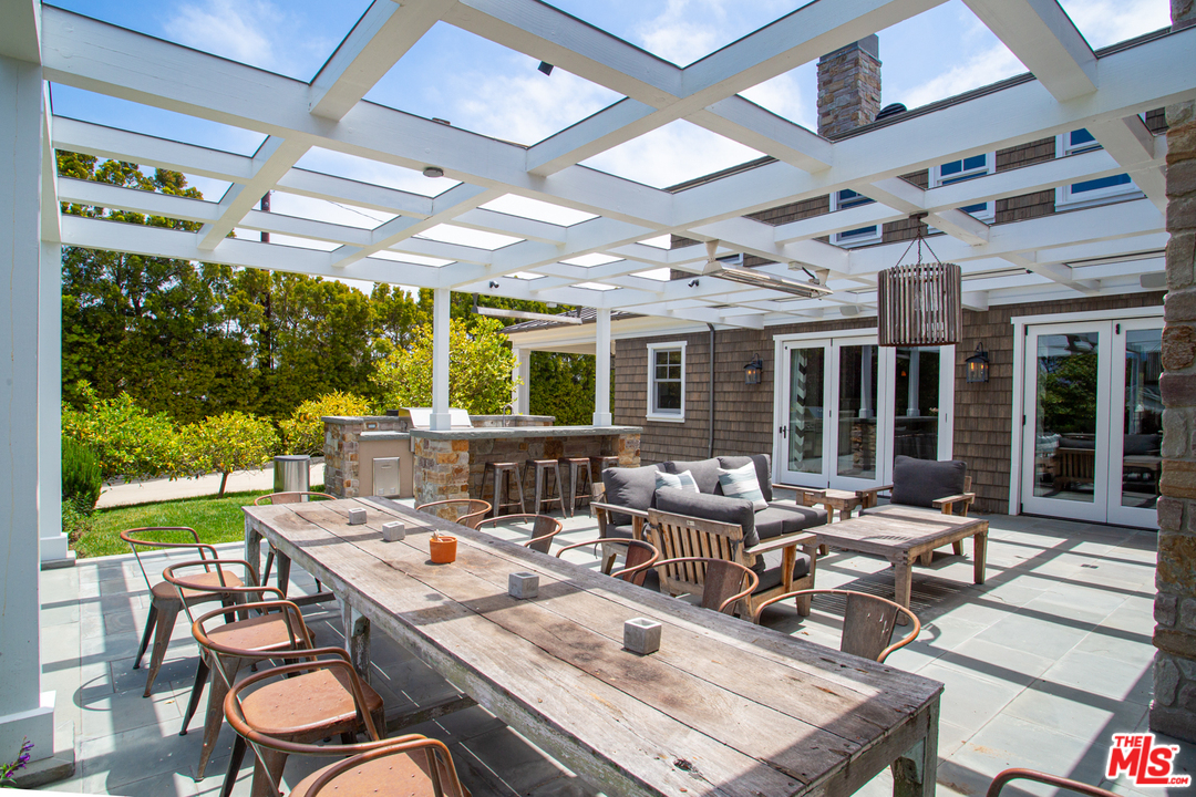 6692 Wildlife Road Malibu, CA 90265 - Photo 32 of 37 a outdoor space with furniture and garden view