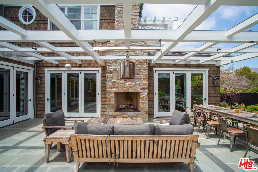 6692 Wildlife Road Malibu, CA 90265 - Photo 33 of 37 a view of a building with a porch