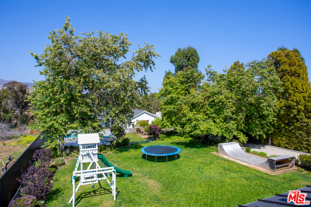 6692 Wildlife Road Malibu, CA 90265 - Photo 37 of 37 a view of a backyard with plants and a garden