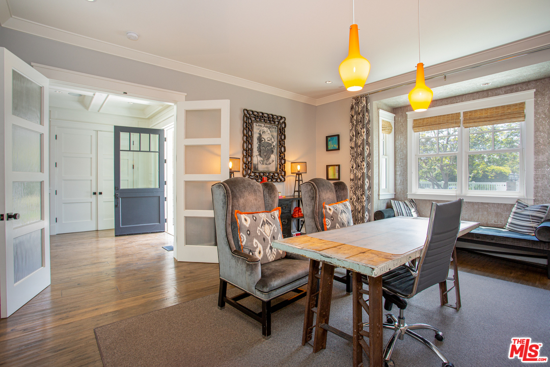 6692 Wildlife Road Malibu, CA 90265 - Photo 5 of 37 a view of a dining room with furniture and chandelier