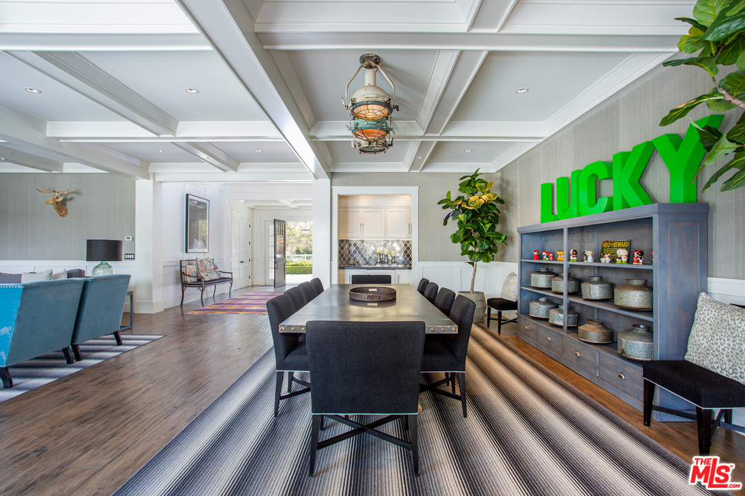 6692 Wildlife Road Malibu, CA 90265 - Photo 7 of 37 a view of a dining room with furniture window and wooden floor