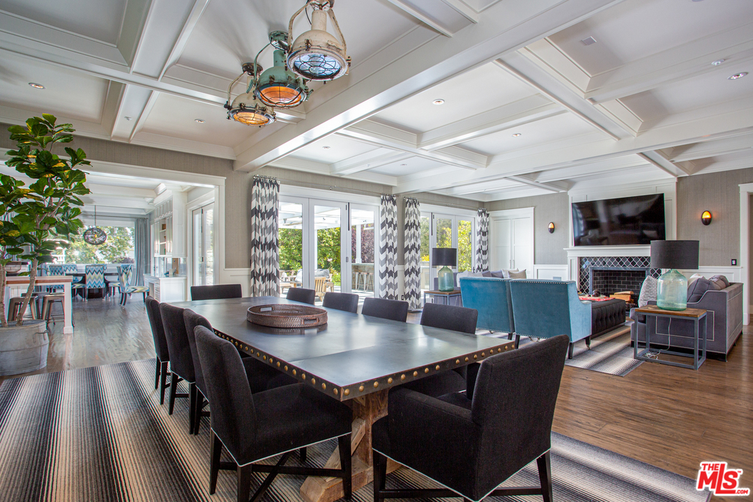 6692 Wildlife Road Malibu, CA 90265 - Photo 8 of 37 a view of a dining room with furniture window and wooden floor