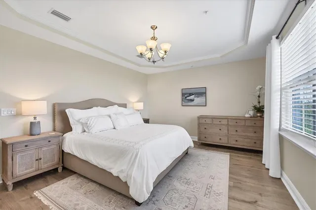 a view of walk in closet with clothes