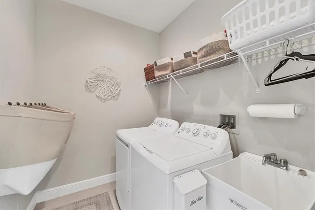 a blue bench sitting in front of a window