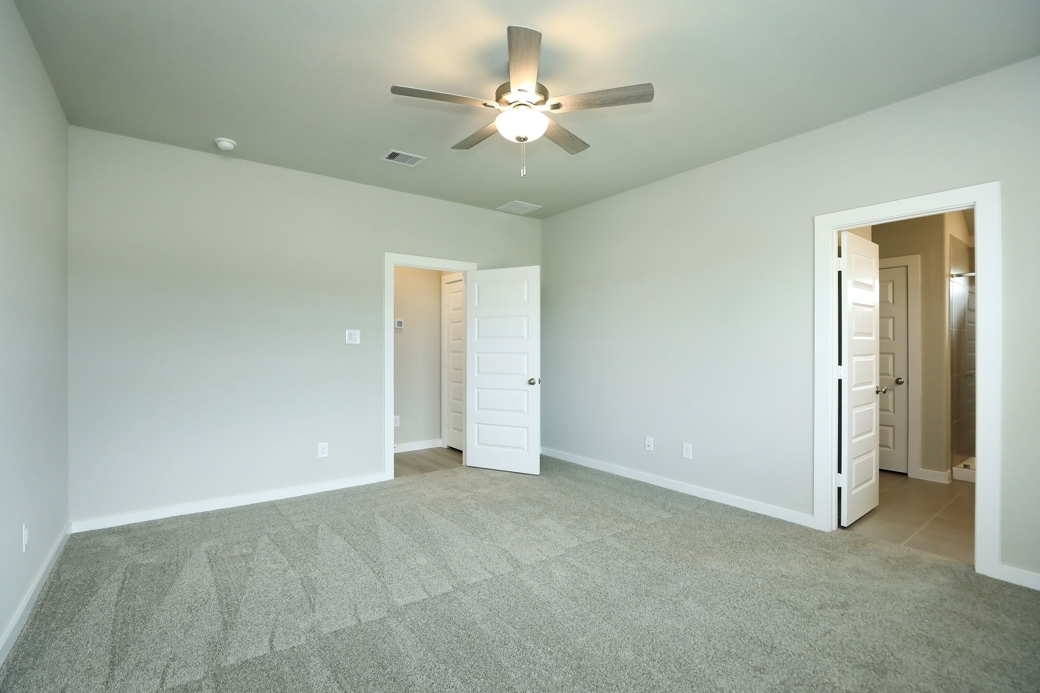 14110 Greystone Ter Street Magnolia, TX 77354 - Photo 9 of 34 The Primary Bedroom Also Offers A Ceiling Fan And A Private En Suite Full Bath!