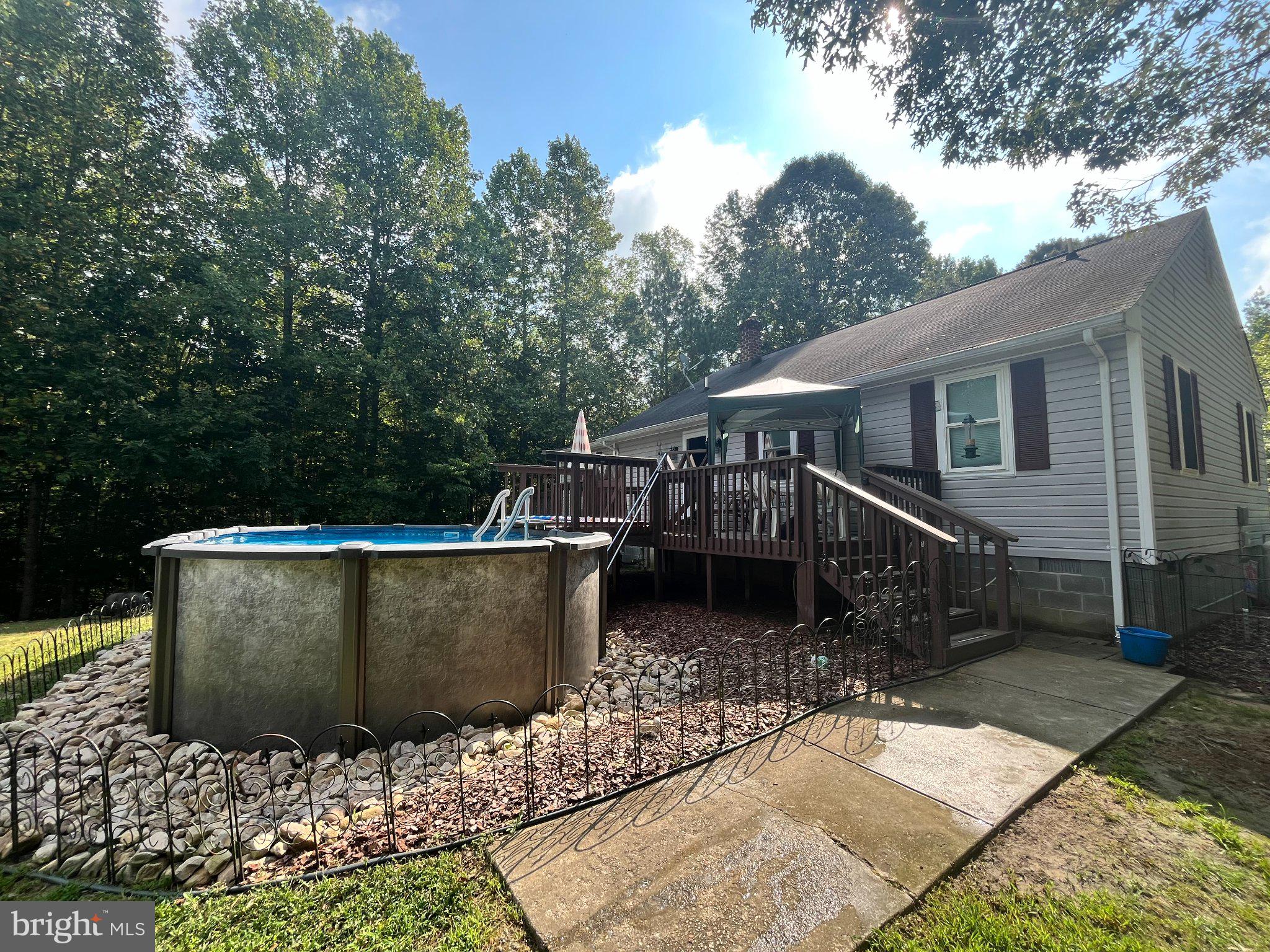 615 Reed Bridge Farm Road Bruington, VA 23023 - Photo 5 of 8 Back of house with pool