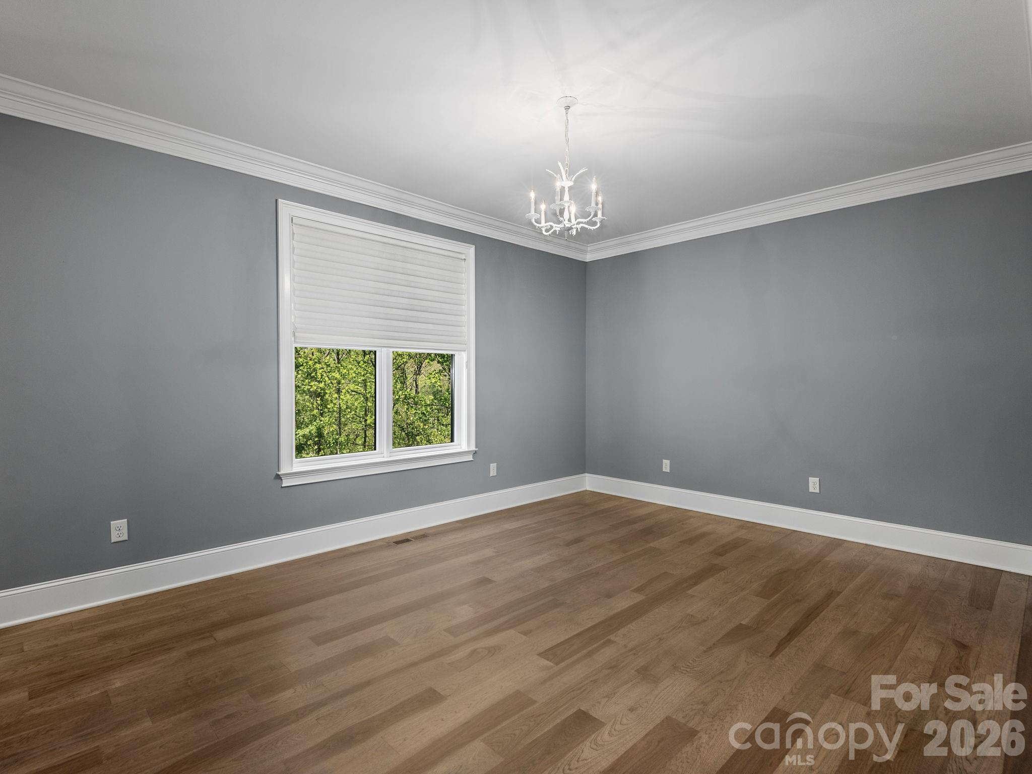 28 Falling Star Court Fletcher, NC 28732 - Photo 20 of 33 wooden floor in an empty room with a window