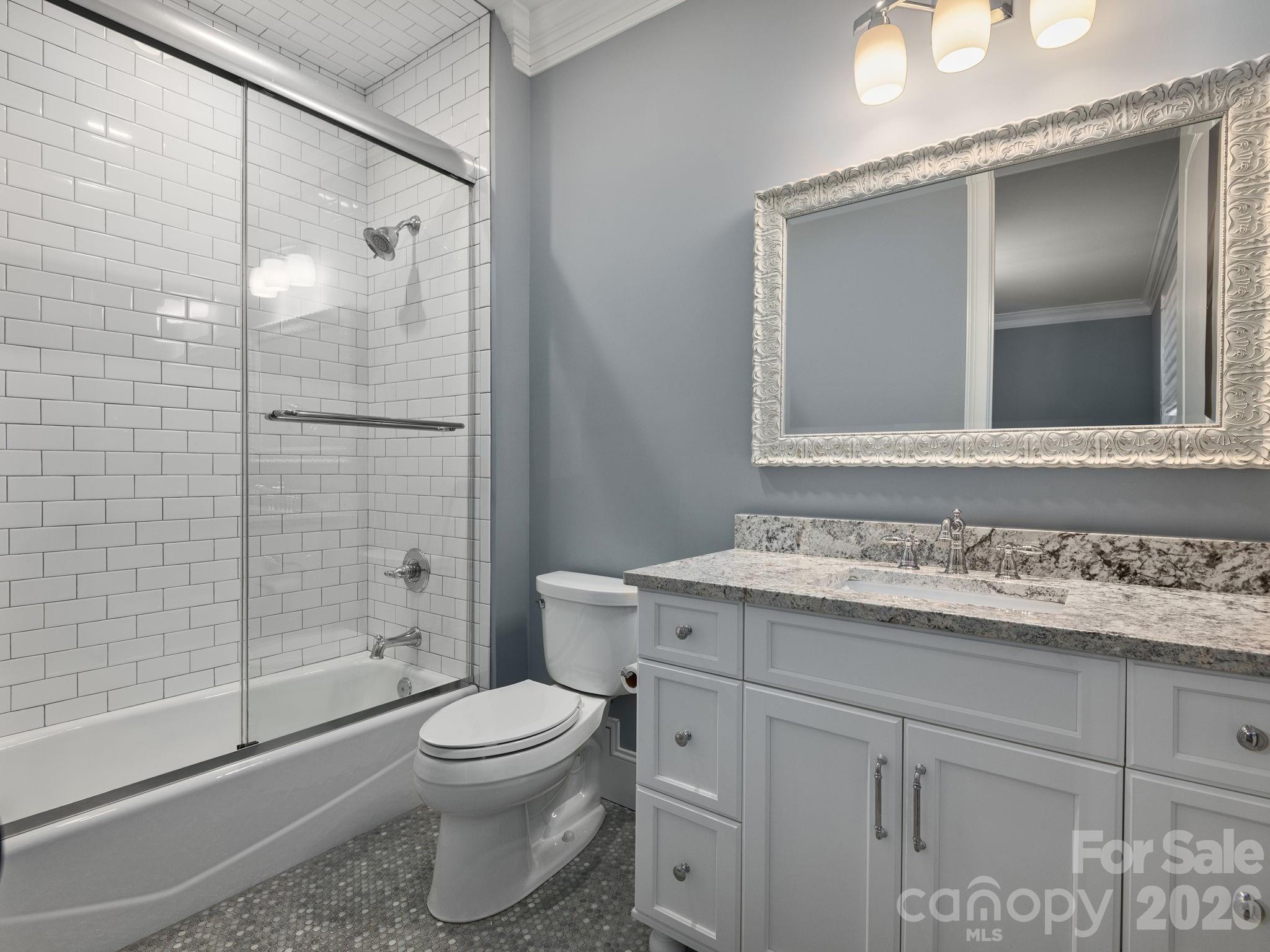 28 Falling Star Court Fletcher, NC 28732 - Photo 21 of 33 a bathroom with a sink toilet and shower