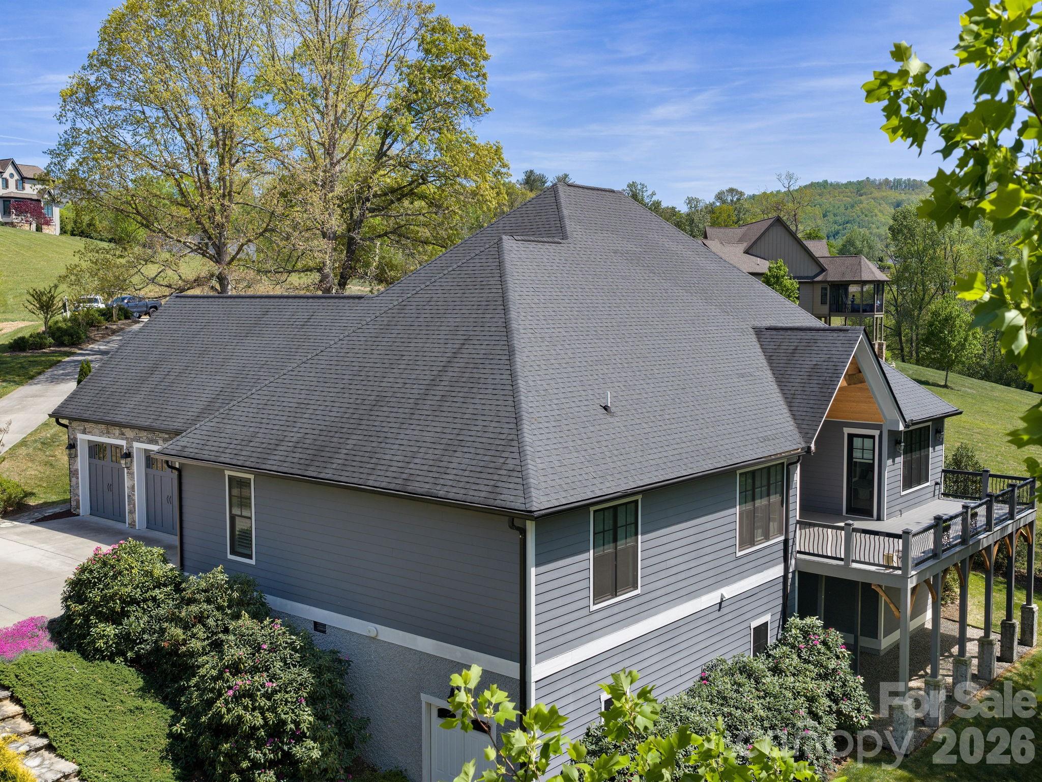 28 Falling Star Court Fletcher, NC 28732 - Photo 28 of 33 a aerial view of a house with a yard and potted plants