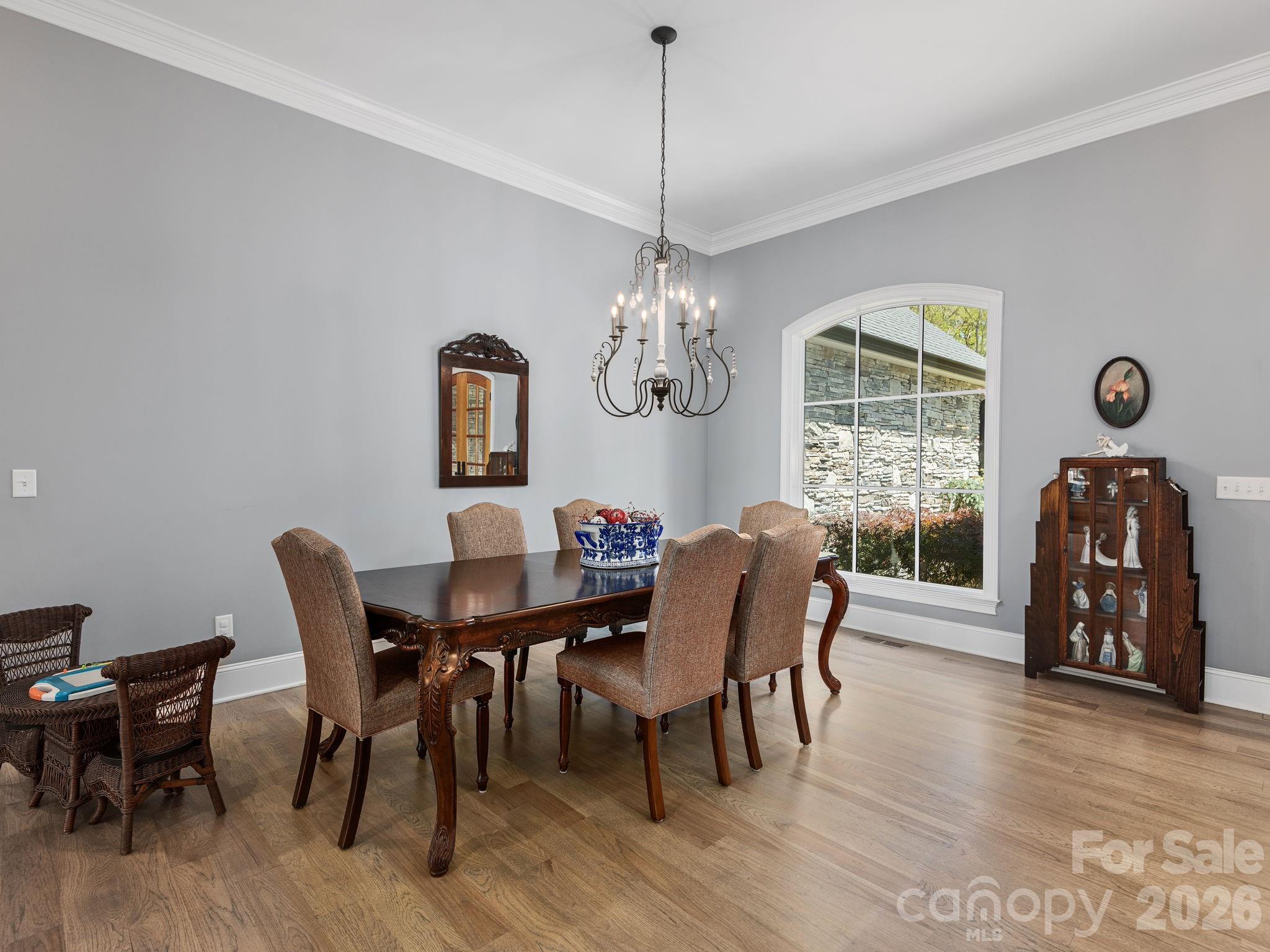 28 Falling Star Court Fletcher, NC 28732 - Photo 7 of 33 a view of a dining room with furniture window and wooden floor