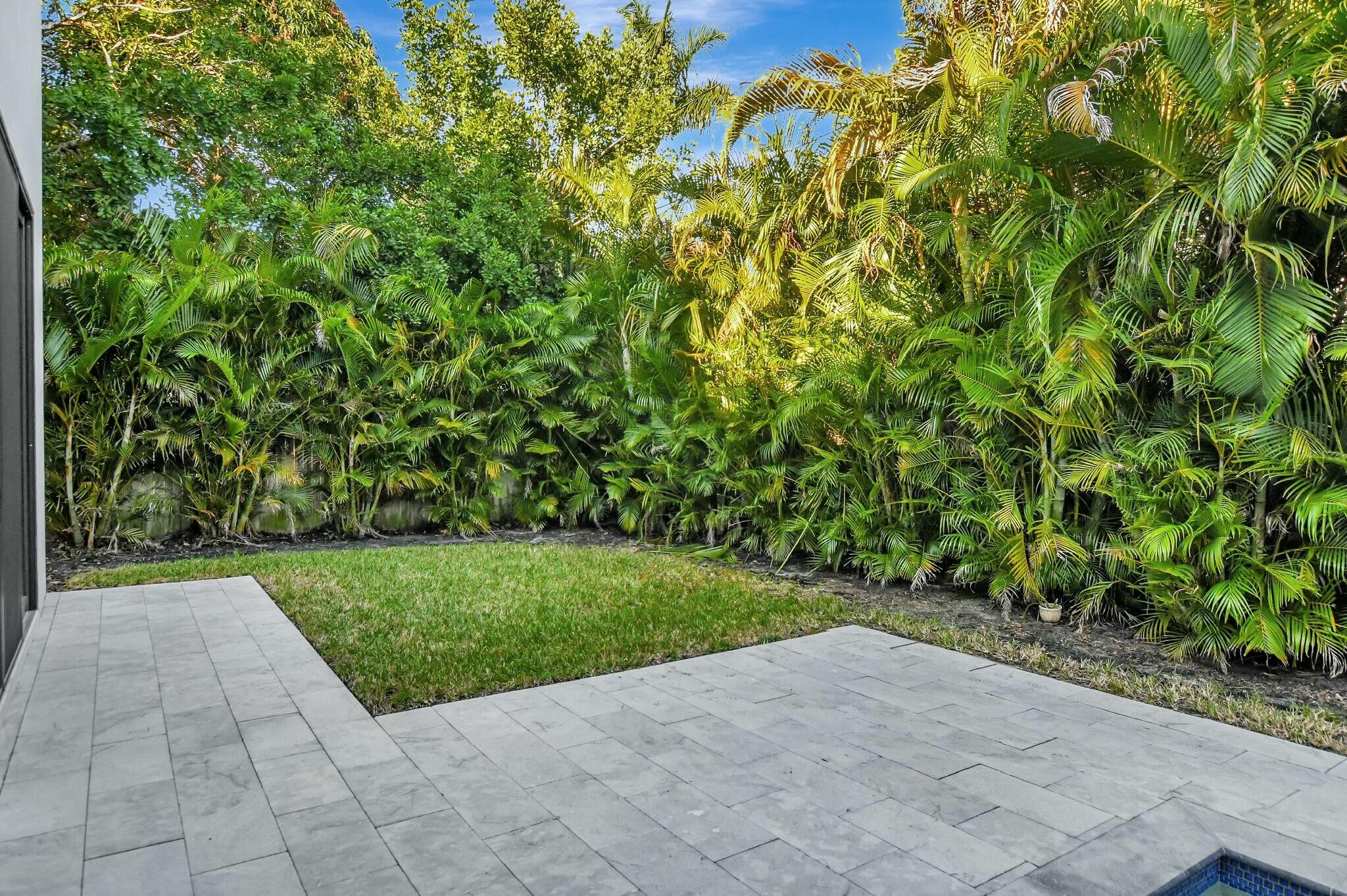 1470 Northeast 4th Avenue Boca Raton, FL 33432 - Photo 73 of 86 a view of backyard with plants and large trees