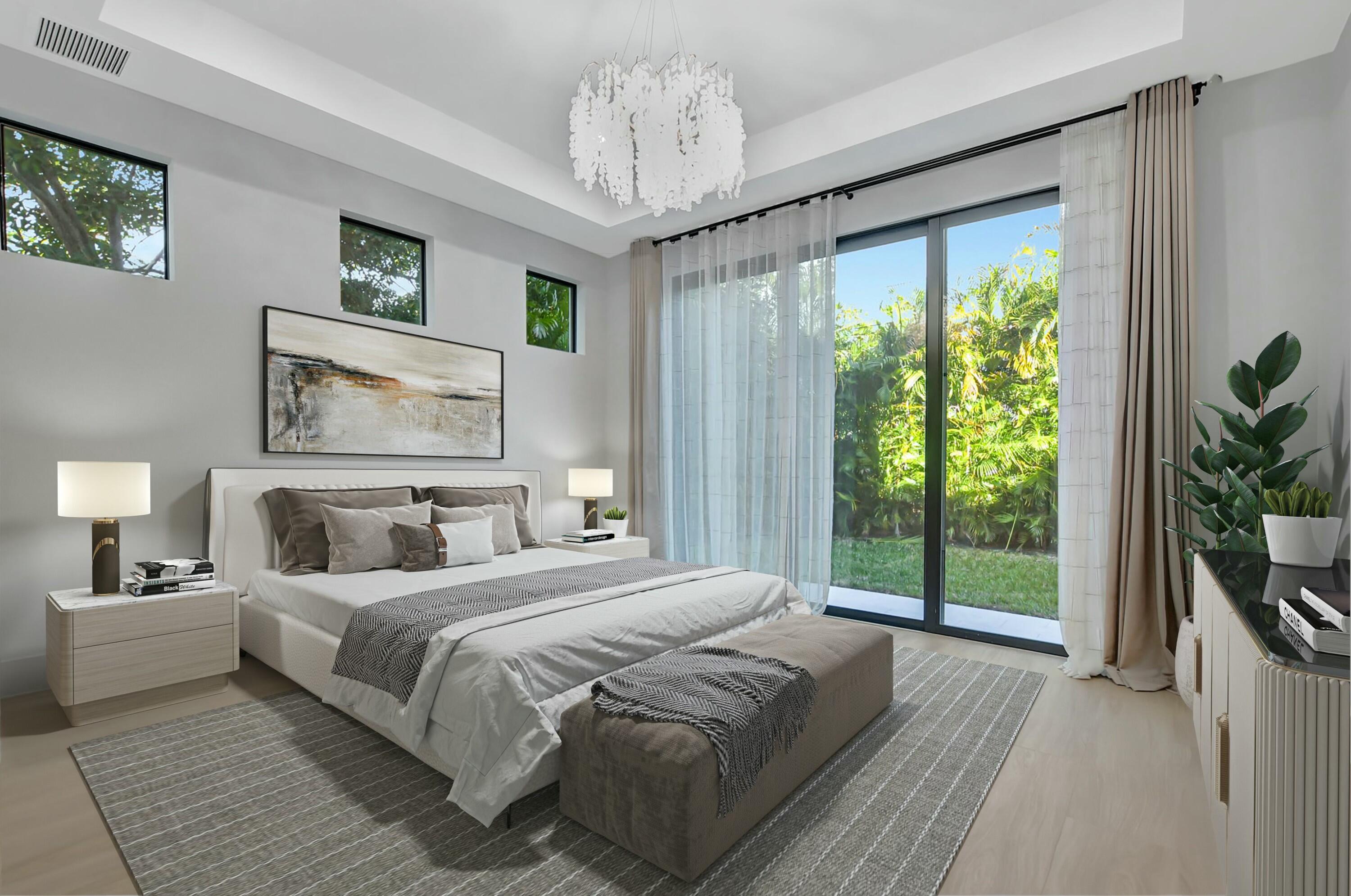 1470 Northeast 4th Avenue Boca Raton, FL 33432 - Photo 10 of 86 a bedroom with a large bed and a chandelier