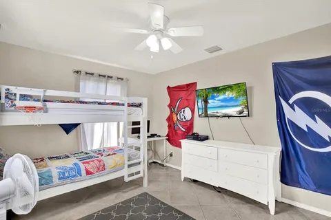 a bedroom with furniture and a bed