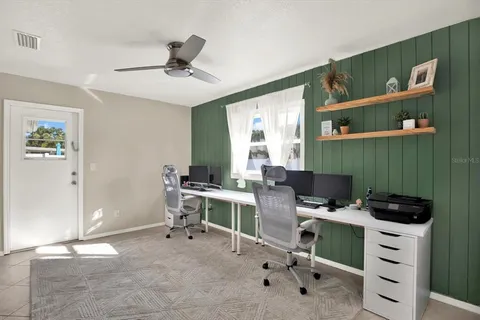 a workspace with furniture and window