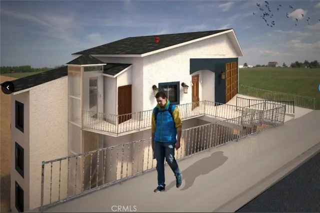 a view of living room kitchen outdoor space and wooden floor