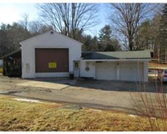 56 Birch Meadow Road Merrimac, MA 01860 - Photo 3 of 7 a front view of a house with a yard