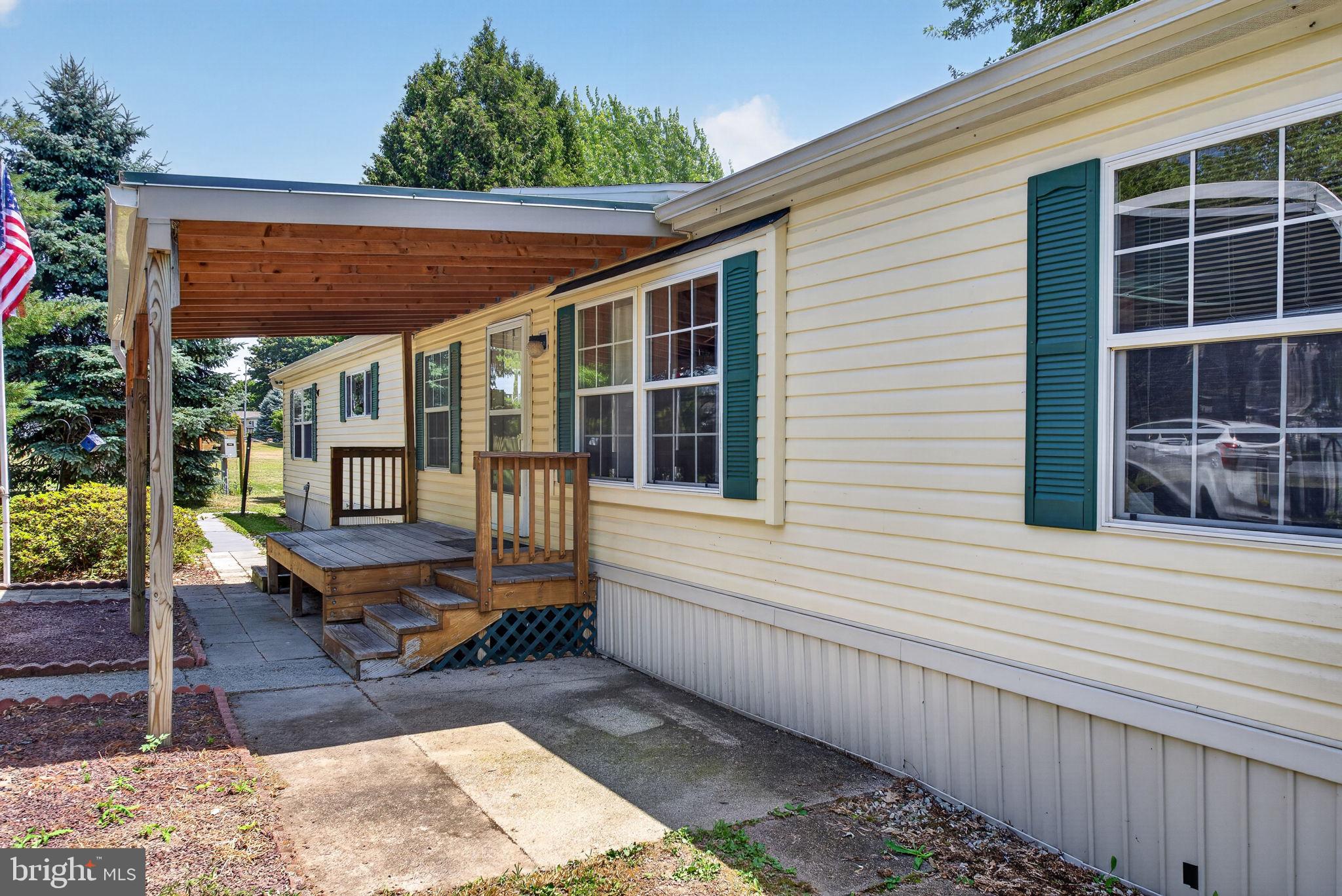 1910 Schubert Road, Unit 8 Bethel, PA 19507 - Photo 2 of 40 Covered front porch to greet guests