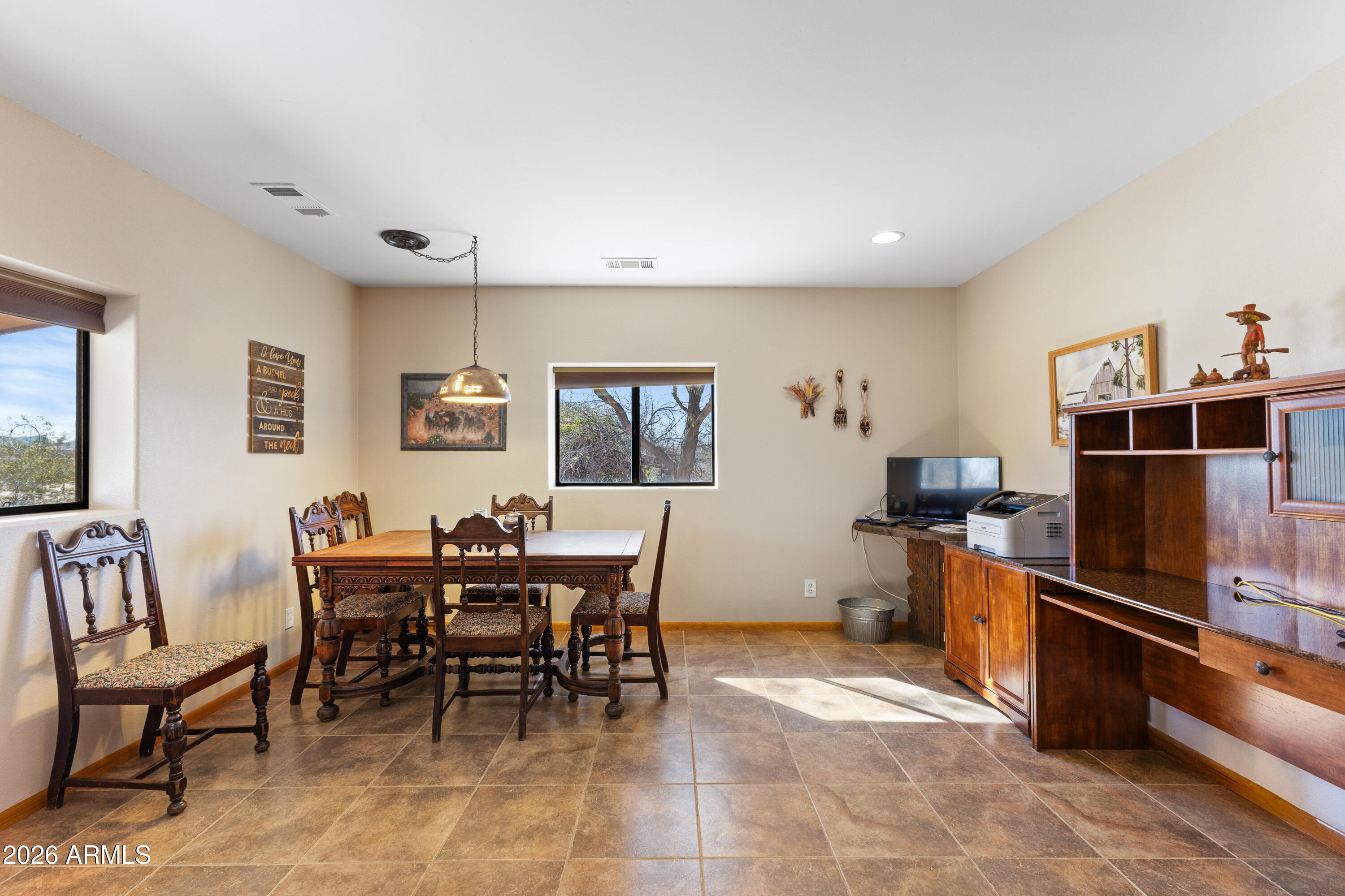 20526 West Carver Road Buckeye, AZ 85326 - Photo 13 of 43 a view of a dining room with furniture