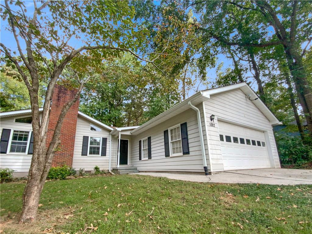 1007 Quail Drive Stockbridge, GA 30281 - Photo 1 of 1 front view of a house with a yard
