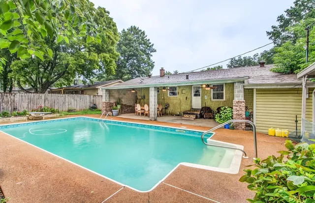 a view of outdoor space yard swimming pool and patio