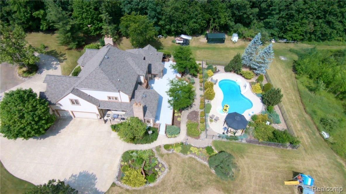 2829 Six Mile Road South Lyon, MI 48178 - Photo 3 of 46 Home includes amazing in-ground pool!