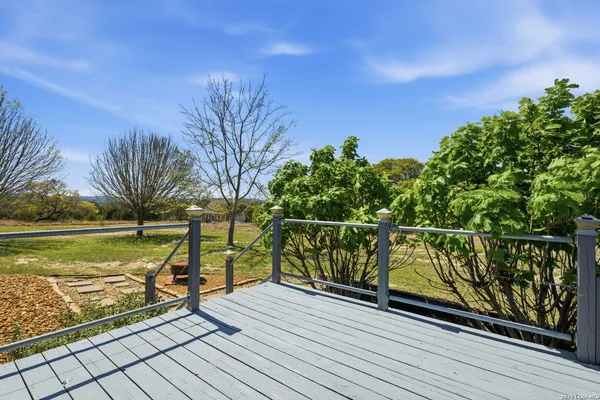 a view of a balcony with lake view and mountain view