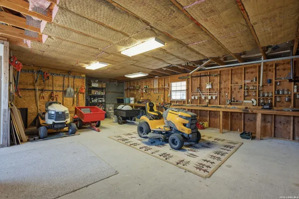 a view of a garage with chairs